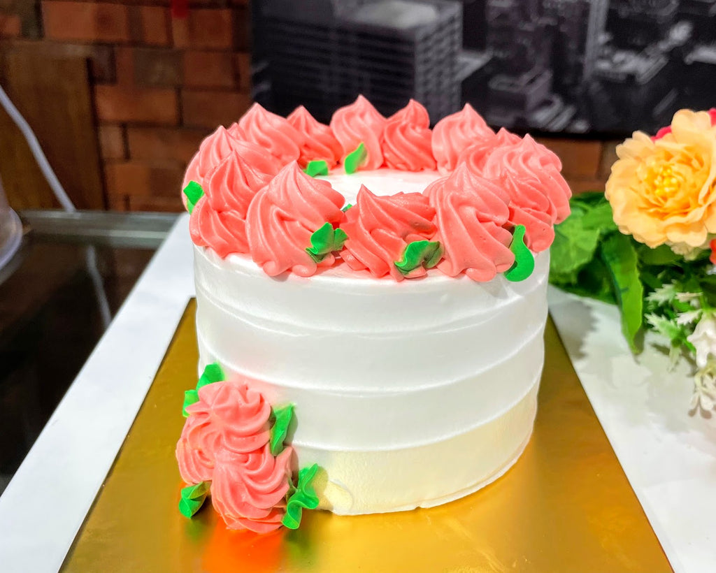 Pink Flora on White Cream Design Cake