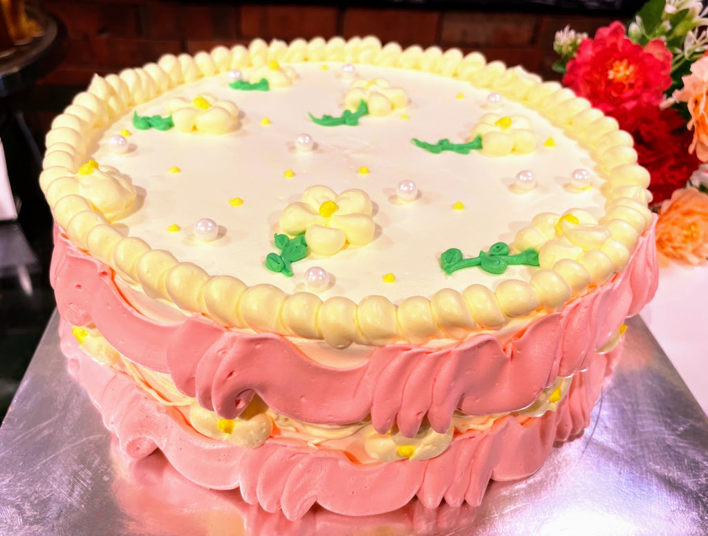 Yellow Cream with Pink Sides Design Cake